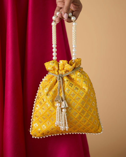YELLOW WITH PEARL HANDLE POTLI BAG